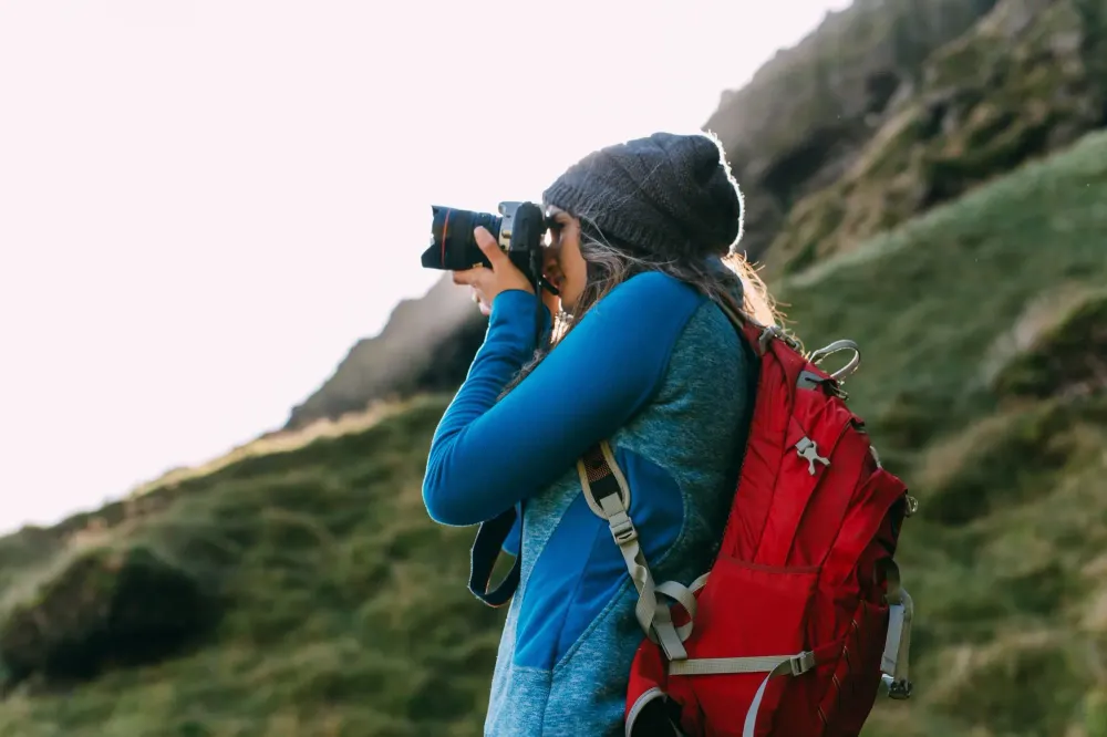travel photographer on mountain